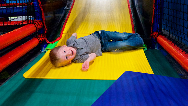 Young Boy On Play Maze