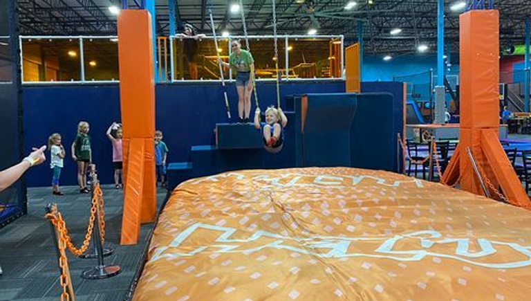 Guests Enjoy Trampoline Trapeze